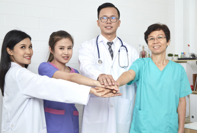 Asian doctor and nurse medical team in hospital